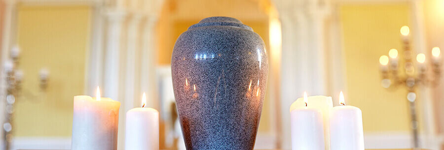 Urn sitting on a table in a well lit room