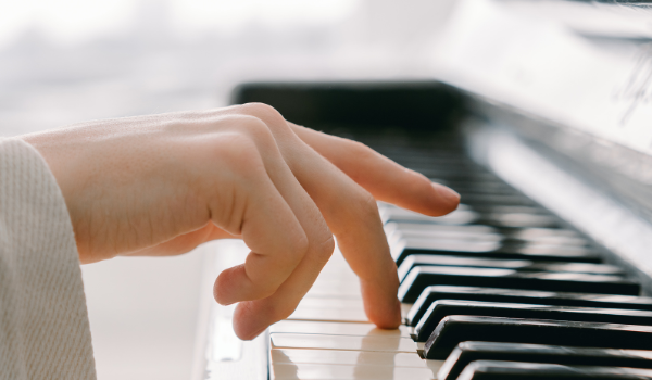 woman playing piano